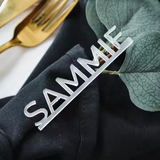 Personalized acrylic letter-shaped wedding place cards for guest names