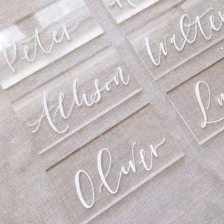 Personalized acrylic name tags for wedding guests