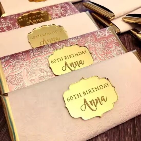 Custom acrylic tags in various shapes for cake gift packaging