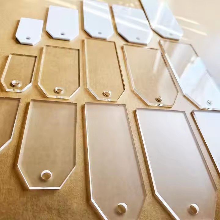 Custom acrylic wedding place cards with guest names and unique shapes
