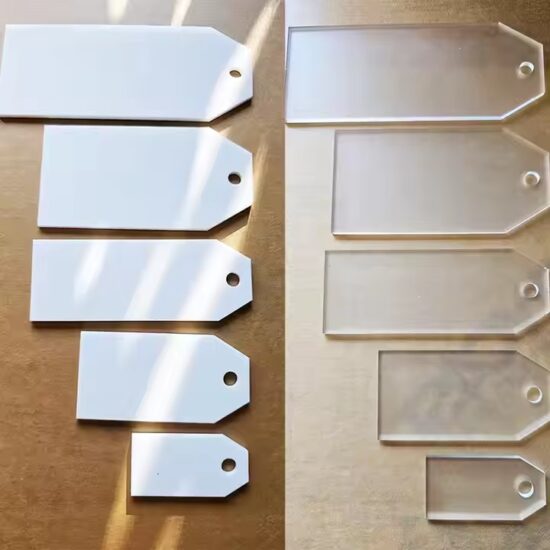 Custom acrylic wedding place cards with guest names and unique shapes