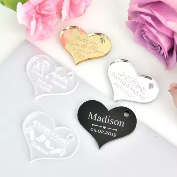 Custom-shaped acrylic gift tags with names and logos