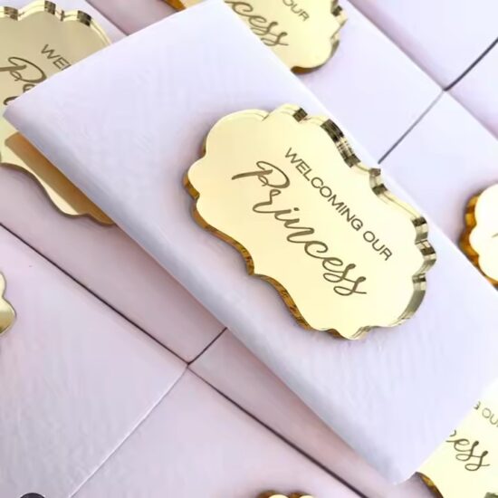 Custom-shaped acrylic gift tags with names and logos
