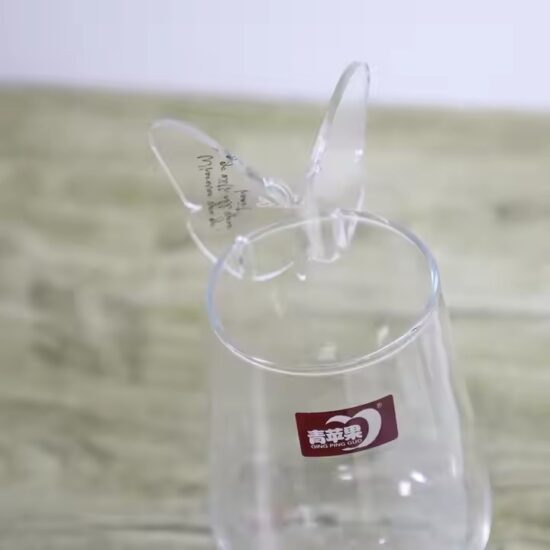 Custom butterfly-shaped acrylic drink tags for party glasses